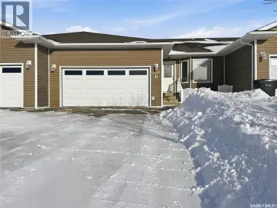 Welcome to 10907 D Amos Drive in North Battleford — a beautifully maintained home in a quiet 5-unit...