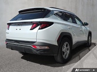 This Tucson comes with; Rear Defrost, Front Wheel Drive, Power Door Locks, Brake Assist, Power Steer... (image 6)