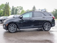 Experience the dynamic drive of the 2022 Chevrolet Equinox AWD RS in a striking black shade with adv... (image 4)