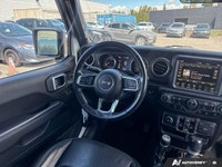 Unleash the spirit of adventure with the 2020 Jeep Wrangler Unlimited Sahara in striking Bright Whit... (image 8)