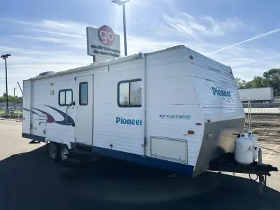 The 2005 Pioneer 270FQS is a spacious travel trailer designed for comfortable camping and extended g...