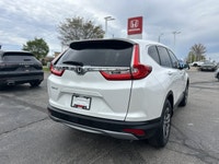 The 2019 Honda CR-V LX in stunning Platinum White Pearl combines versatility and efficiency, making... (image 4)