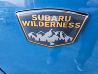 The 2022 Subaru Outback Wilderness in a striking blue finish with an all-wheel-drive system is your... (image 9)