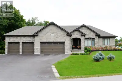 Set on an expansive corner lot of over half an acre, this Gorgeous Custom-Built Sun filled in presti...