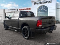 Feel the surge of a legendary *5.7L Hemi V8 engine* under your command with this striking *2023 Ram... (image 3)