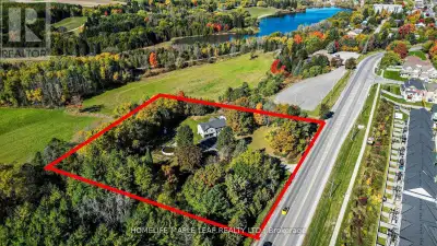 Location, Location, Location! Exceptional 3+2 bedroom raised bungalow with a walk-out finished basem...