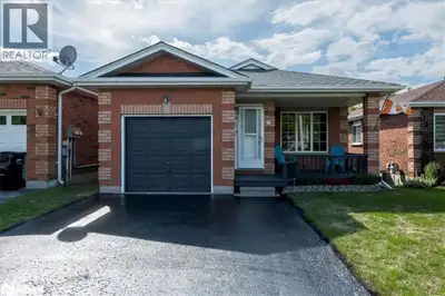Charming Bungalow with Walk-Out Basement & Pool – Welcome to 74 Sundew Drive, a beautifully updated...