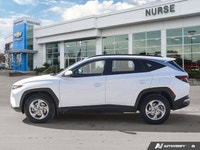 The 2023 Hyundai Tucson Preferred, featuring a brilliant Crystal White exterior complemented by a re... (image 2)