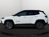 This 2026 JEEP COMPASS TRAILHAWK 4X4 has the following options Prem Cloth/Leather Trim Bucket Seats,... (image 1)