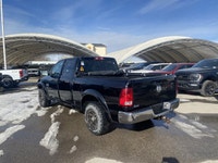 Calling all enthusiasts for this stunning and agile 2014 Ram 1500 ST. Take pleasure in the quick shi... (image 2)