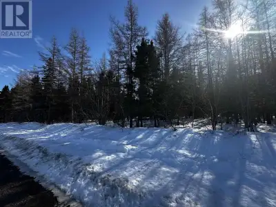 Set along the scenic Whycocomagh-Port Hood Road in Southwest Ridge, Cape Breton Island, this impress...