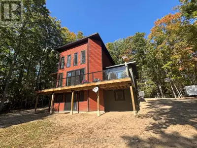 Welcome to 78 Indian Trail! This custom built, five-year-old home is set along the scenic SAUBLE RIV...