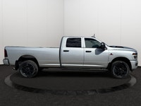 This 2026 RAM 2500 TRADESMAN CREW CAB 4X4 has the following options Cloth 40/20/40 Bench Seat, 8.4 T... (image 5)