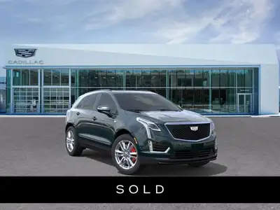 Stock #YK104659 AMVIC LICENSED DEALER The 2026 Cadillac XT5 Sport AWD, finished in Emerald Lake Meta...