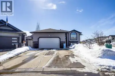 This exceptionally well-maintained bi-level home offers 2,756 sq ft of fully finished living space o...