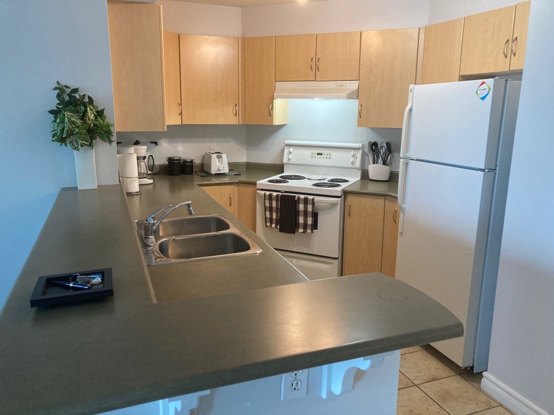 Clean and Bright Fully Furnished 2 Bedroom at Discovery Pointe! Long