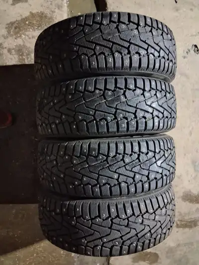 TIRES 215 55 17 Pirelli Ice Zero TM (Studded - studs can be removed) Tread Depth 10 10 11 11 / 32nds...