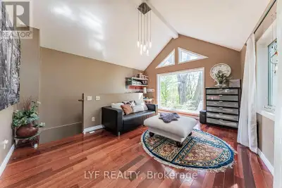Exceptional Updated Back-Split Home Situated On A Rare Oversized Pie-Shaped Lot In A Highly Sought-A...
