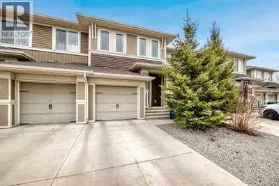 FULLY FINISHED WALKOUT - BACKING ONTO SCHOOL YARD - NO CONDO FEES - ALMOST 2200 SF – ATTACHED GARAGE...