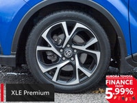 The 2021 Toyota C-HR XLE Premium in blue with FWD is a perfect blend of dynamic handling and contemp... (image 4)