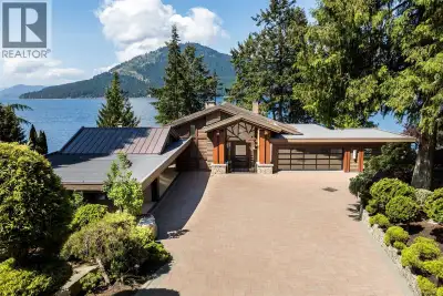 Set behind a gated entrance in North Saanich’s exclusive Lands End enclave, this extraordinary 2.73-...