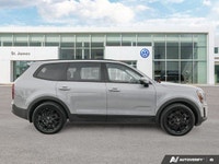 * Nappa leather upholstery * Heated and ventilated front seats * Second-row captain's chairs * 10.25... (image 5)