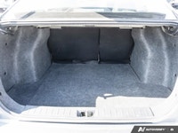 Navigate cityscapes with confidence in this sophisticated former daily rental 2024 Nissan Versa SV.... (image 6)