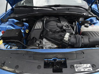 The 2023 Dodge Charger Scat Pack 392 in striking blue with a robust rear-wheel drive offers a dynami... (image 6)