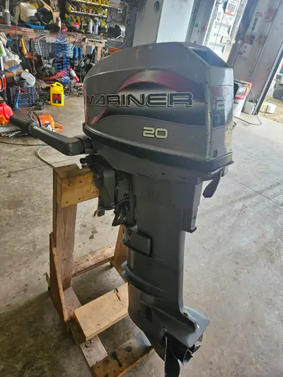 Mariner outboard 20 hp tiller, 2 stroke, long shaft,runs well, will show runnng, $1500