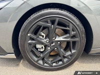 The crisp 2025 Hyundai Elantra N Line Ultimate, sporting a dynamic Amazon Grey exterior and a sophis... (image 8)