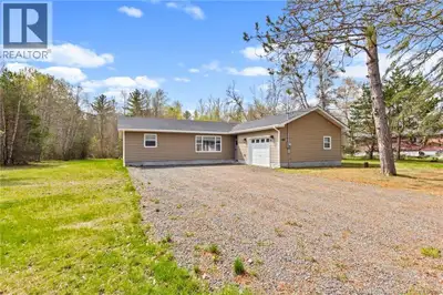 Welcome to this stunning 3-bedroom, 2-bathroom bungalow in a convenient location within the Village...