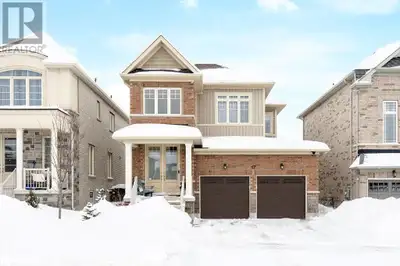 Step onto the welcoming front porch and enter into the sun-drenched open concept main floor, boastin...