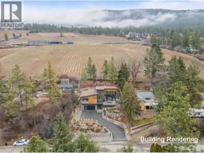 Set above the shimmering shoreline of Okanagan Lake, this exceptional residential lot offers a rare...