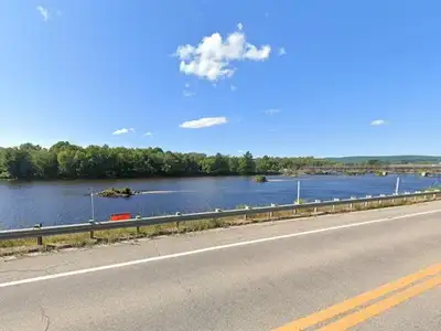 3/4 acre lot located on the banks of the Coulonge River with a view of the Red Bridge. A great mediu...