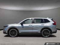 The 2026 Honda CR-V Hybrid EX-L AWD in stunning Silver is a versatile SUV that blends efficiency wit... (image 2)