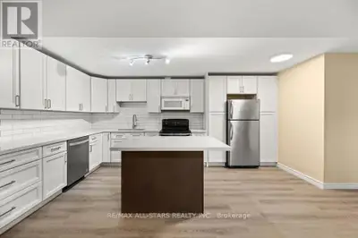 Elegant Fully Renovated "Legal" 2 Bedrooms 1 Bath Ground Level Apartment In A Beautiful All-Brick Ra...
