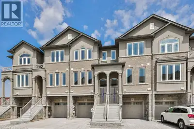Beautiful, bright and upgraded 3 bedroom townhouse in a quiet subdivision in highly sought-after Sto...