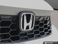 Experience the future of driving with the new 2026 Honda Civic Hybrid sedan, now available in a stri... (image 8)