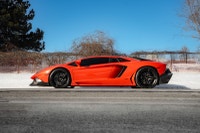 2017 Lamborghini Aventador LP700-4 finished in a striking Orange exterior is the embodiment of extre... (image 5)