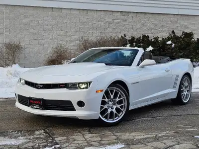 THIS 2015 CHEVROLET CAMARO RS 2 LT CONVERTIBLE IS A HEAD-TURNING RIDE POWERED BY A STRONG AND RELIAB...