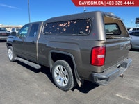 The 2014 GMC Sierra 1500 SLE 4WD Double Cab Standard Box combines bold GMC styling, proven V8 power,... (image 2)