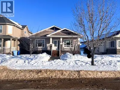 BUNGALOW WITH A WHOPPING 3100+ SQ FT OF LIVING SPACE, 6 BEDROOMS, 4 FULL BATHROOMS, IN-FLOOR HEAT, A...