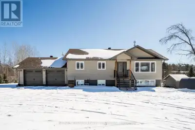 Welcome to 211 Eglinton Road North, a well-appointed custom-built raised bungalow set on a private 1...