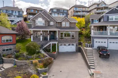 This stunning home offers a perfect blend of modern updates and elegance with incredible views of Ka...