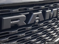 This Ram 1500 has a dependable Gas/Electric V-6 3.6 L/220 engine powering this Automatic transmissio... (image 9)