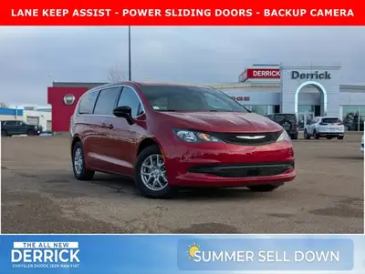 The 2026 Chrysler Grand Caravan SXT in Red Hot Pearl with a Black interior combines style, comfort,...