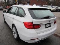 ALL WHEEL DRIVE WAGON. FINISHED IN ARTIC WHITE WITH BLACK LEATHER INTERIOR. ALLY WHEELS WITH NEW TIR... (image 2)