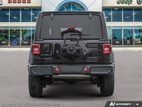 This Jeep Wrangler has a strong Regular Unleaded V-6 3.6 L/220 engine powering this Automatic transm... (image 4)