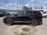 Le Honda CR-V Touring 2018 est un VUS compact haut de gamme reconnu pour sa fiabilité, son confort e... (image 7)
