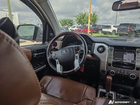 Experience proven capability and premium comfort with the 2018 Toyota Tundra Platinum, featuring 260... (image 8)